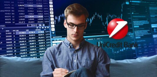 trader che prende appunti e logo Unicredit